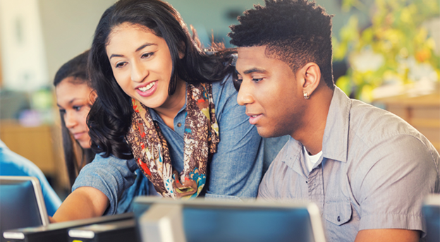 Young people working on computers.