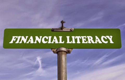 Roadside sign that says Financial Literacy