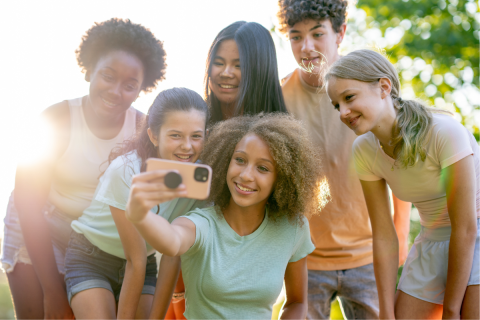 Diverse friends taking a picture together.