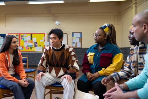 Group of diverse people in a meeting.