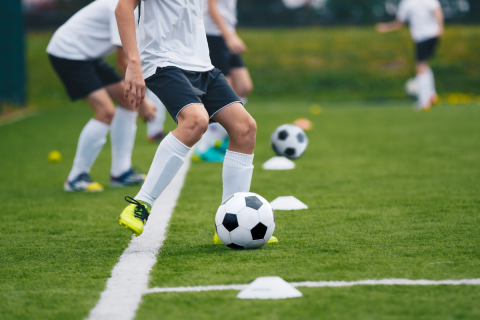 Youth playing soccer.