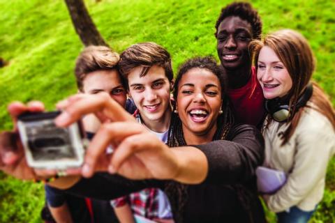 teens taking a selfie