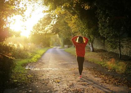 Woman walking in sun