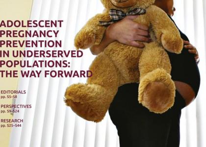 Cover of journal supplement with pregnant girl holding stuffed animal