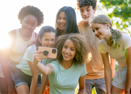 Diverse friends taking a picture together.