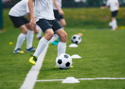 Youth playing soccer.