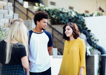 Diverse teens talking and supporting each other