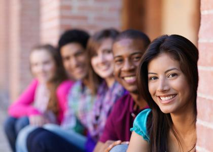 Diverse group of teens smiling