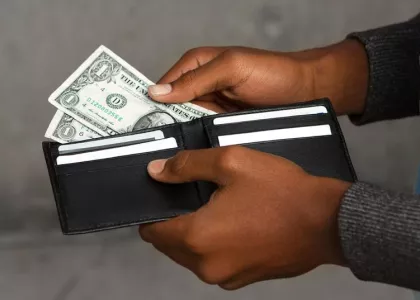 Taking money out of wallet