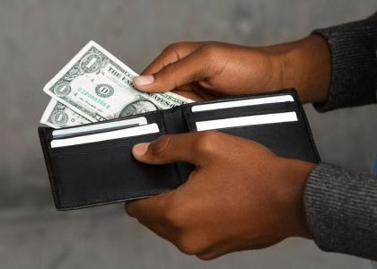 Taking money out of wallet